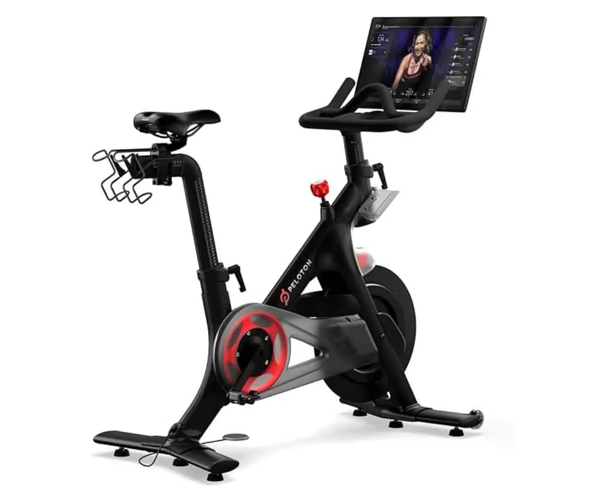 Peloton Indoor Exercise Bike with interactive screen and compact home gym design