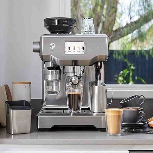 A premium all‑in‑one espresso machine featuring touchscreen controls, a built‑in grinder, and automatic milk frother.